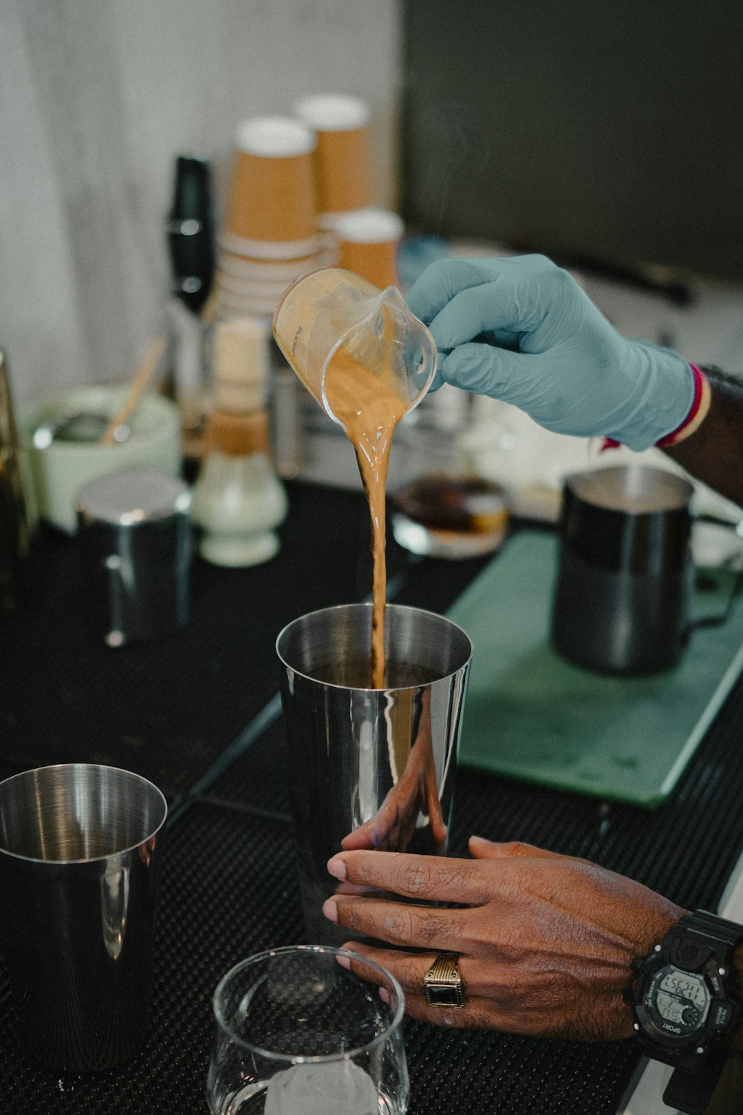 Freshly brewed coffee in a cozy café setting, highlighting the craft of coffee making and a warm, minimalist atmosphere. ☕